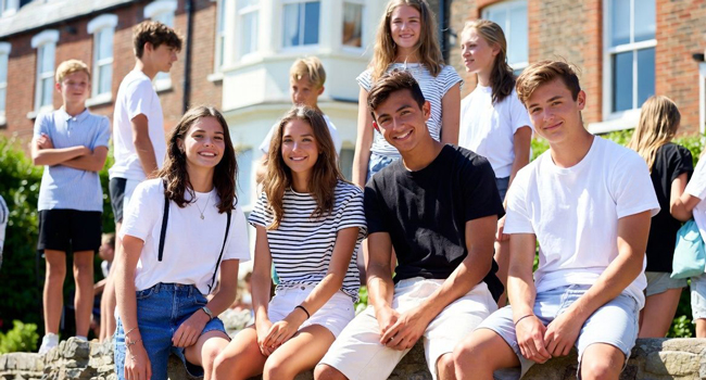  Group of students in Eastbourne England during a LISA! language study holiday in front of their accommodation together