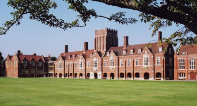 Historic college building in Eastbourne England with large lawn during a LISA! language study holiday
