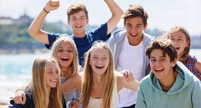 Group of students in Jersey during a LISA! language study holiday by the sea having fun together and enjoying unforgettable moments