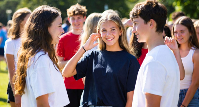 Language study holidays in Portsmouth with LISA! – support, safety and community for students Group of students in Portsmouth during a LISA! language study holiday talking together and experiencing support and safety