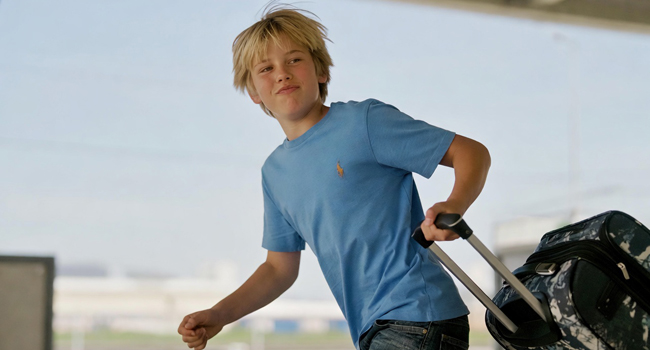 English language study trips to Malta for students with travel to Salina Beach A student on an English language study trip in Malta arrives with a suitcase for travel to Salina Beach