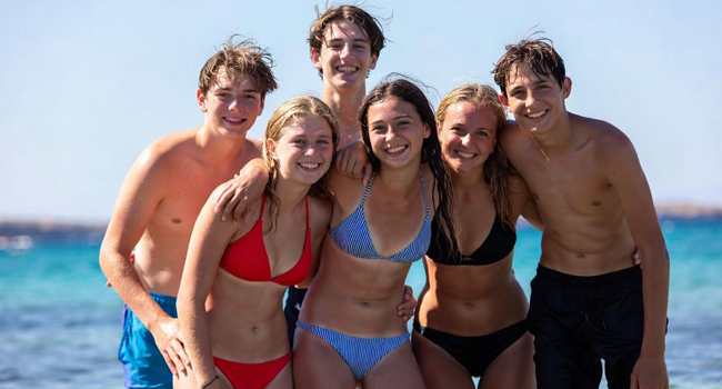 Student language study holidays in Malta with LISA! – activity programme by the beach Group of students by the sea in Malta during the activity programme of a LISA! language study holiday for students
