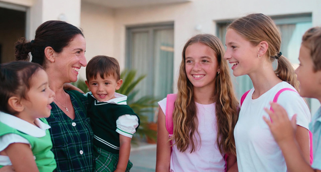English language study holidays in Malta for students with host family Students on an English language study holiday in Malta being welcomed by a host family in St Julian’s