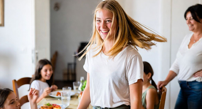 Young student enjoying daily life with a host family during a LISA! Italian language course for young learners in Florence, Italy