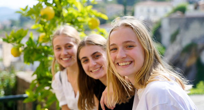 Students during a LISA! Italian language course for young learners in Italy near lemon trees